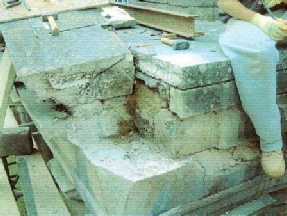 Pediment of the Columbarium Brookwood Cemetery showing cracked stonework