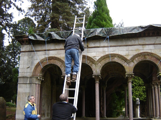 Placing the temporary tarpaulin over the Drake mausoleum Brookwood Cemetery