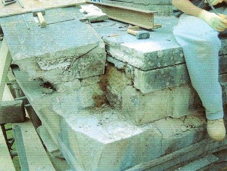 Pediment of the Columbarium Brookwood Cemetery showing cracked stonework